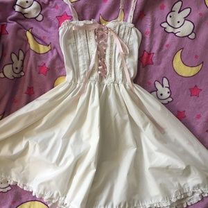 White lace cami dress with pink ribbons